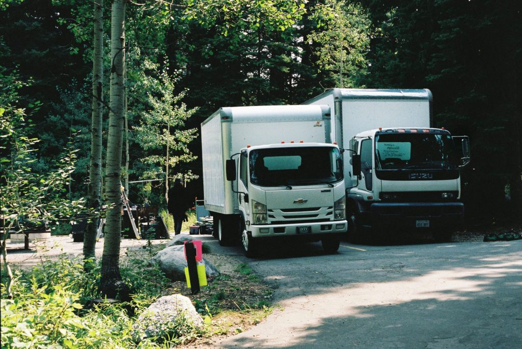 white and black truck on road during daytime
